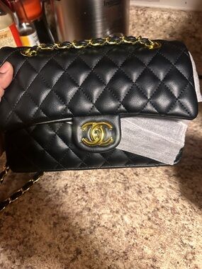CC Black Quilted Leather Crossbody Bag with Gold
10x7x3.5
Drop 22 1/2